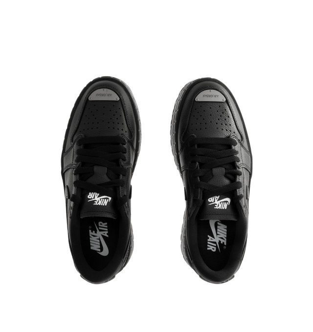 Image 5 of 5 - BLACK - JORDAN Air Jordan 1 Brooklyn Low Sneaker featuring genuine full-grain leather in the upper, Nike Air in the heel, foam midsole, perforated toe box and elevated lugged rubber outsole adds height and extra comfort. 