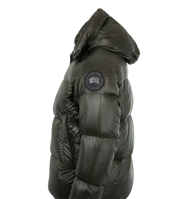 Image 3 of 3 - NAVY - Canada Goose Crofton Puffer Jacket has a down-filled adjustable hood, reflective details, a spread collar, a 2-way zipper front, side zip pockets, an interior storm flap, Power Stretch cuffs, an interior drawcord, a packable interior left pocket. Wind-resistant and water-repellent. Sustainable materials. Made in Canada.  