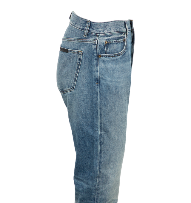 Image 2 of 3 - BLUE - Fear of God Essentials 5 pocket jean made in 100% cotton denim in a light vintage wash in a timeless straight leg fit WITH FRONT ZIP. Antique brass hardware provides a natural vintage appearance. An Essentials label is stitched on the back pocket. 