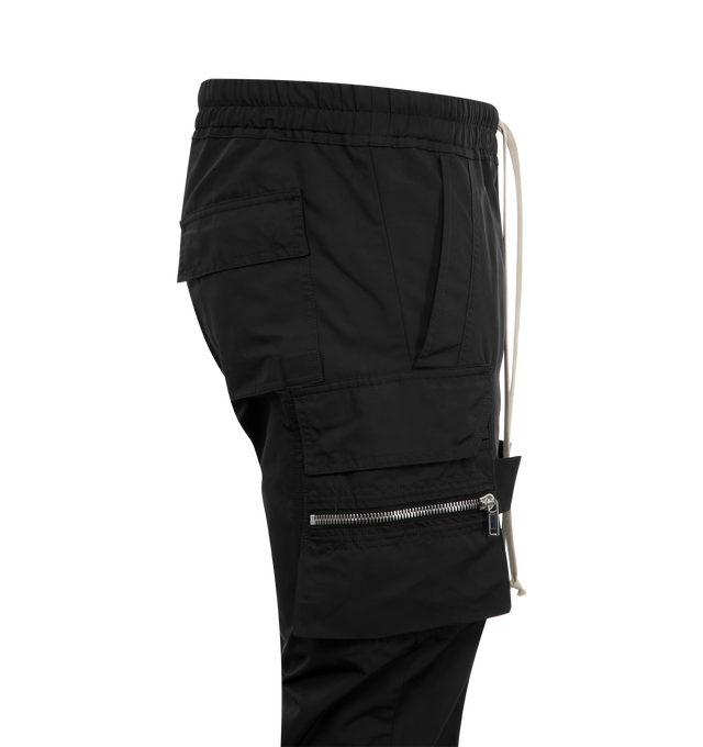 Image 3 of 3 - BLACK - RICK OWENS Mastodon Cargo Pant featuring slim-fit, zippered cargo flap pockets, tabs on the outer thigh, signature elongated drawstrings, elasticized waist and pulls on. 97% cotton, 3% elastane. Made in Italy. 