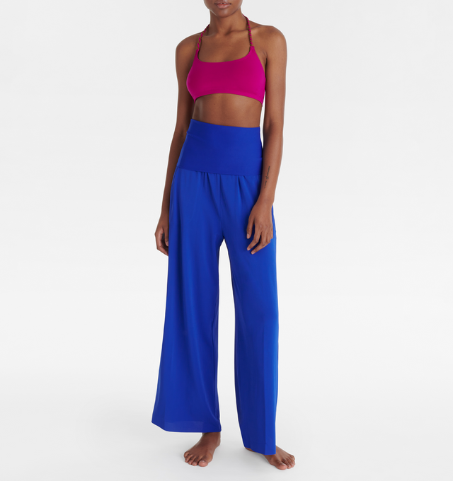 Image 3 of 6 - BLUE - ERES Dao High-Waisted Trousers featuring wide legs and side pockets with tone on tone stitching. Offers versatile styling to wear as a bustier jumpsuit or pants.  Main: 94% Polyamid, 6% Spandex. Second: 84% Polyamid, 16% Spandex. Made in France. 