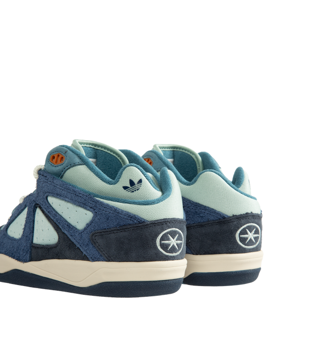 Image 3 of 5 - BLUE - Adidas Originals x Bad Bunny Men's BADBO 1.0 Unisex Shoes feature a bold, contemporary silhouette that reflects the latest collaboration between adidas Originals and Bad Bunny. Designed with premium materials and distinctive detailing, this statement sneaker blends sport-inspired functionality with the artist's signature creative vision, delivering a modern look rooted in self-expression and individuality. Upper: Nubuck with hairy suede overlaysOutsole: Rubber. 