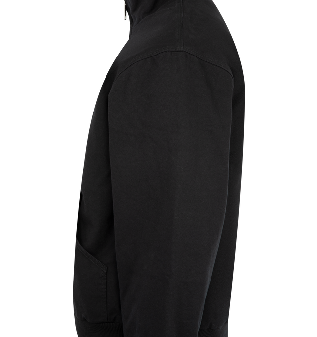 Image 3 of 3 - BLACK - CARHARTT WIP Ravon Jacket featuring a sportswear-inspired silhouette, heavyweight cotton canvas with a quilted polyester lining, two-way zip closure, a kangaroo pocket on the front, a zipped chest pocket on the inside and woven Square Label. 100% cotton. 