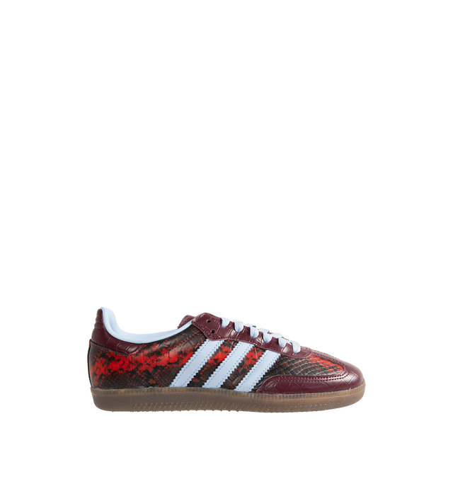 Image 1 of 5 - RED - Adidas Women's Samba OG Shoes reinterpret the brands iconic soccer-inspired silhouette with premium leather construction and heritage detailing. Designed with a lace-up closure and the signature elongated tongue, this updated version pairs classic Samba styling with modern versatility. Metallic Samba branding and Trefoil detailing celebrate the legacy of adidas Originals, while the durable rubber outsole provides reliable traction for everyday wear. Main Material: Leather. Closure: Lace 