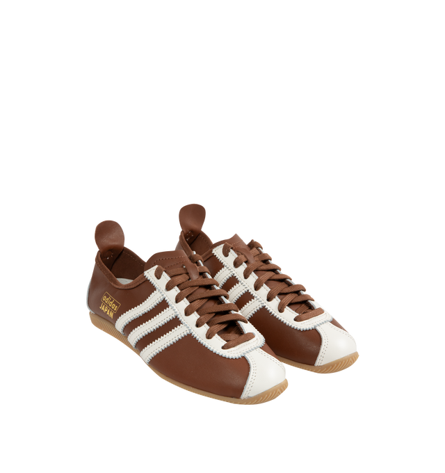 Image 2 of 5 - BROWN - ADIDAS Originals Japan Sneakers are a lace-up style with premium leather uppers intricate, detailed stitching, and rubber gum soles.  Unisex style in men's sizes. 