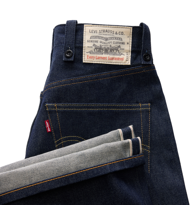 Image 6 of 8 - BLUE - Sacai X Levi's Men's Belted Wide leg pants are crafted from a medium-dark wash cotton denim and feature a high-rise waist, wide-leg silhouette, a buckled belt, signature Levi back-pocket design, and utility-inspired patch pockets. Main Material: 100% Cotton. Made in Japan. 