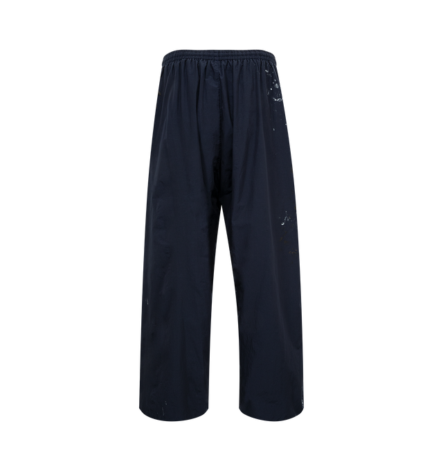 Image 2 of 4 - BLUE - Balenciaga Tracksuit Pants have an elastic waist, side pockets, paint splatters, an embroidered brand logo, and contrast piping. Made in Italy. 