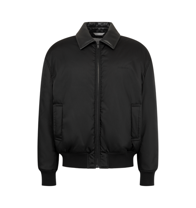 Image 1 of 3 - BLACK - Balenciaga Men's Cocoon Bomber Jacket is crafted from black cotton-blend twill and features a calfskin collar, dropped shoulders, and a single-zip closure. Two slash pockets and ribbed cuffs and hem complete the design. Main Material: 80% Cotton, 16% Polyamide, 4% Elastane. Lining: 100% Polyester. Filling: 100% Polyester. Embroidery: 100% Polyester. Leather Detail: Calfskin. Made in Italy. 