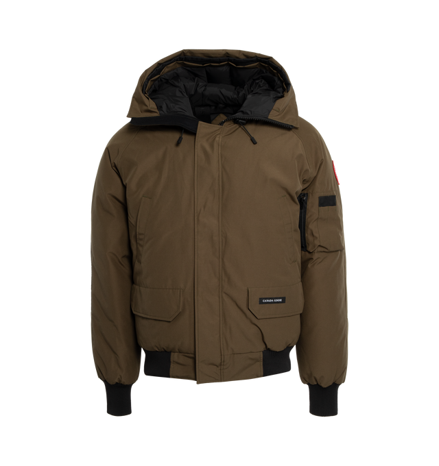 GREEN - CANADA GOOSE Chilliwack Down Jacket featuring detachable trim at hood, funnel neck, two-way zip closure and press-stud placket, welt and flap pockets, rib knit hem and cuffs, raglan sleeves, logo patch and utility pocket at sleeve, zip pocket and patch pockets at interior, elasticized shoulder straps at interior and full nylon satin lining. 84% polyester, 16% cotton. Lining: 100% polyamide. Fill: 80% duck down, 20% duck feathers. Made in Canada.