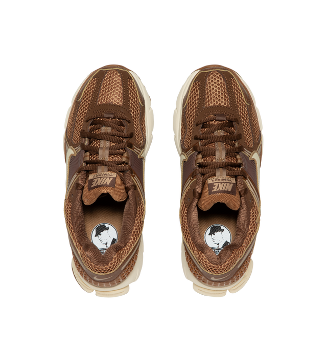Image 5 of 5 - BROWN - Nike Womens Zoom Vomero 5 Sneakers feature a layered design with textile, synthetic leather, and plastic accents. Finished with Zoom Air cushioning, supportive side caging, reflective details, and a durable rubber outsole. Main Material: Textile, Synthetic Leather, Plastic; Outsole: Rubber. Imported 