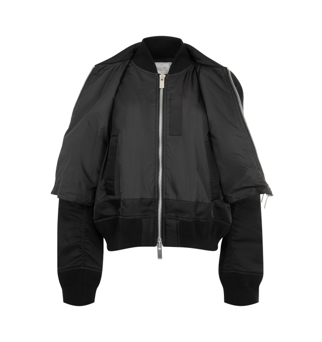 Image 4 of 4 - BLACK - Sacai Nylon Twill Blouson is crafted from nylon twill with lightweight padding. Features a blouson silhouette, mixed-media paneling, full lining, and modern utility-inspired construction. Outer: 100% Nylon; Parts: 55% Polyester, 44% Cotton, 1% Polyurethane; Lining: 100% Polyester; Filling: 100% Polyester. Made in Japan. 