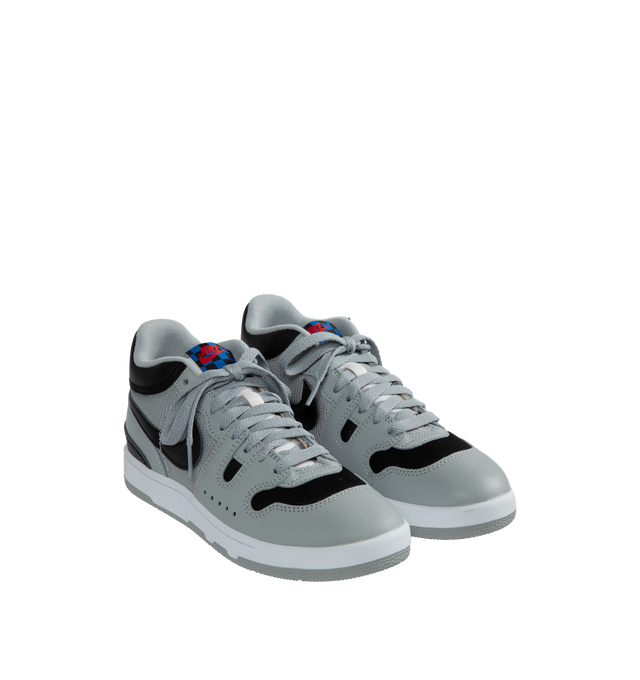GREY - NIKE Attack QS SP Sneakers are a lace-up style with mesh upper, leather overlay, branded heel, signature logo, rubber outsole, padded tongue, and woven logo label. 