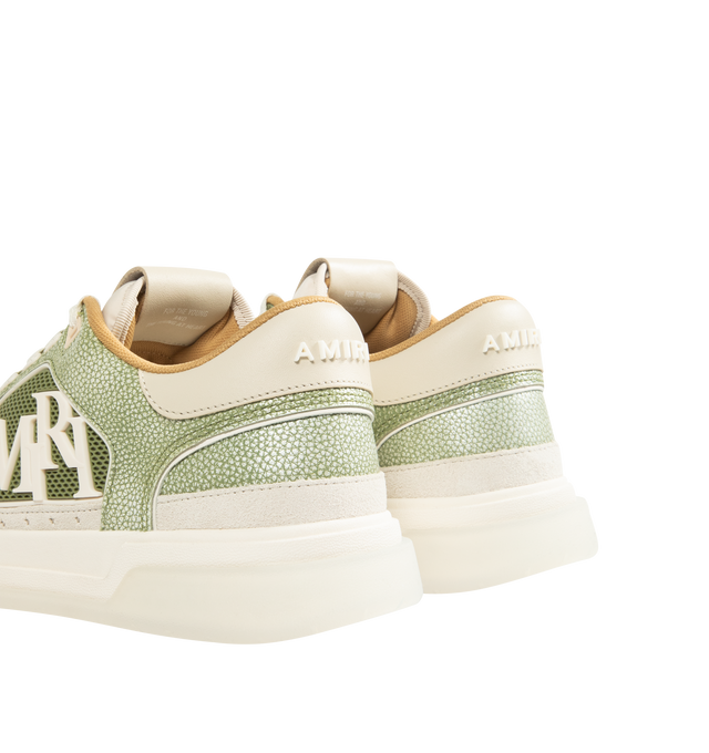 Image 3 of 5 - GREEN - AMIRI Pebbled Classic Low Sneakers featuring low-top buffed and pebble-grained leather sneakers, perforations at vamp and sides, lace-up closure, logo patch at padded tongue, padded collar, rubberized mesh trim at sides, logo bonded at sides and heel collar, mesh lining and treaded rubber sole. Upper: leather, rubber. Sole: rubber. 