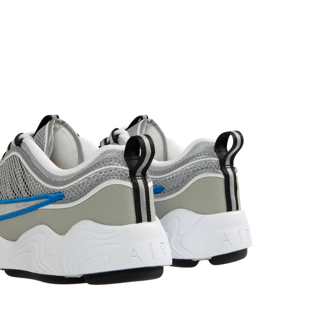 Image 3 of 5 - SILVER - Nike Air Zoom Spiridon SP Sneakers are a lace-up style with reflective piping, mesh uppers, Zoom Air cushioning, metallic overlays, signature branding details, contoured footbeds, and rubber outsoles.  