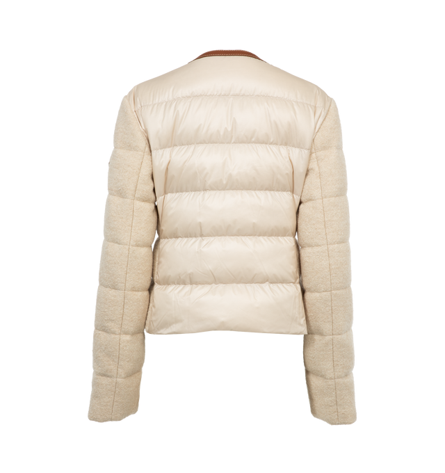 Image 2 of 3 - NEUTRAL - MONCLER Serinde Short Down Jacket featuring soft boucl, longue saison lining, leather trim, down-filled, zipper closure, welt pockets and leather logo patch. 62% wool, 28% viscose/rayon, 10% polyamide/nylon. Lining: 100% polyamide/nylon. Padding: 90% down, 10% feather. 
