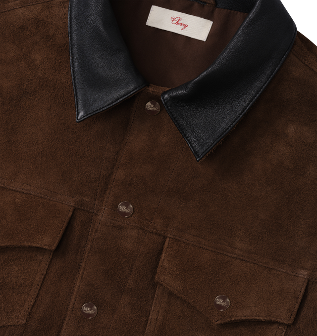 Image 3 of 5 - BROWN - Cherry LA Suede Trucker Jacket is crafted from premium calf suede and features a classic trucker silhouette with a contrasting black leather collar, chest patch pockets, and side-seam welt pockets. Designed with a timeless fit, this elevated outerwear style is finished with branded snap closures and refined leather detailing throughout. Main Material: Calf Suede. Collar: Black Leather. 