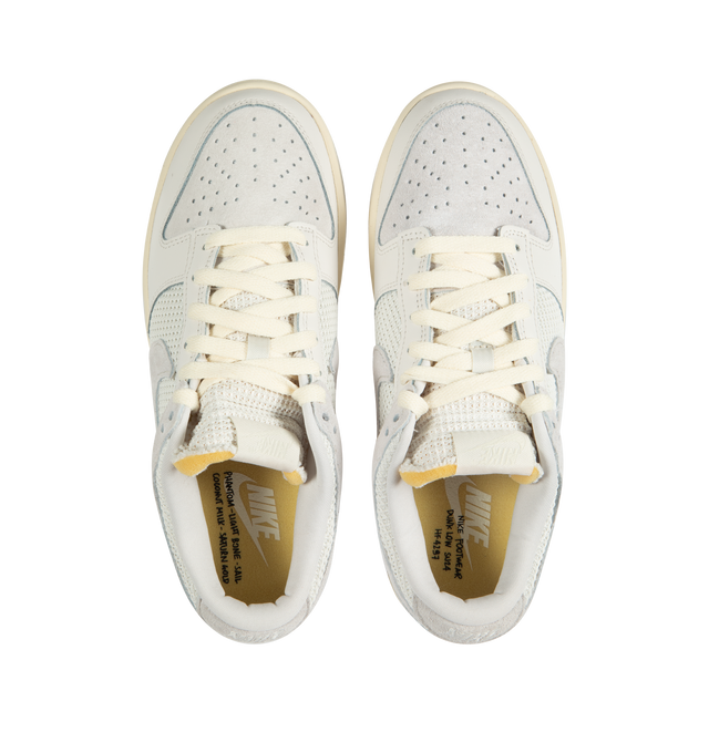 Image 5 of 5 - WHITE - NIKE Dunk low-top sneakers in a lace-up style crafted with leather upper, textile lining and rubber sole. 