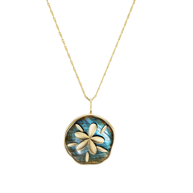 Image 1 of 1 - GOLD - Brent Neale Large Carved Stone Sand Dollar Pendant Necklace featuring 18K yellow gold with a carved blue chalcedony pendant. Dimensions: Height: 34 mm; Width: 34 mm; Chain: 18" Small Wheat Chain. Hirshleifers offers a range of pieces from this collection in-store. For personal consultation and detailed information about jewelry, please contact our dedicated stylist team at personalshopping@hirshleifers.com. 