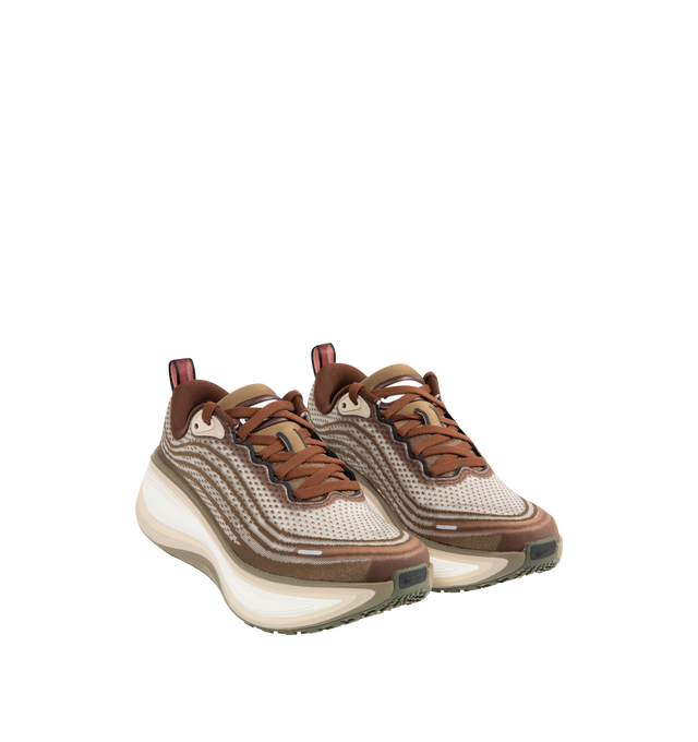 Image 2 of 5 - BROWN - NIKE Vomero Plus Sneaker featuring mixed textile upper, ultra-responsive ZoomX cushioning, high-abrasion rubber outsole, webbed lace loops for an adjustable fit and reflective details. 