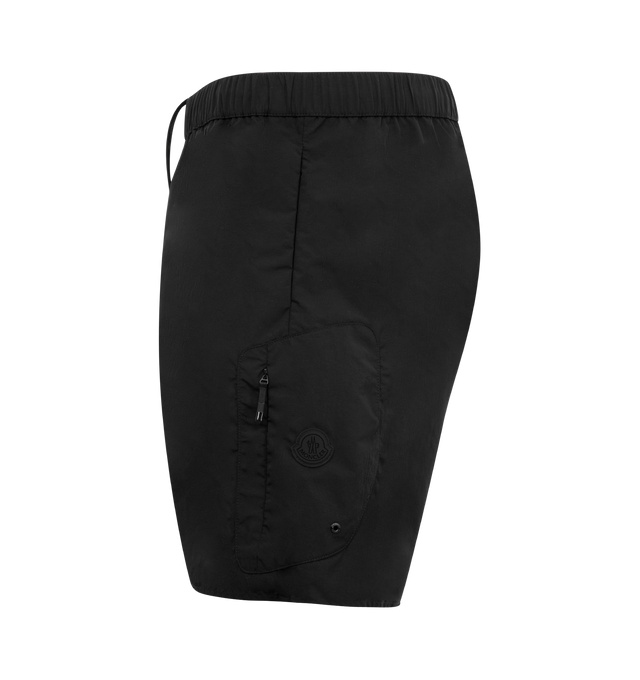Image 3 of 3 - BLACK - MONCLER Swim Shorts featuring concealed drawstring at elasticized waistband, three-pocket styling, rubberized logo patch at cuff and partial mesh lining. 100% nylon.  
