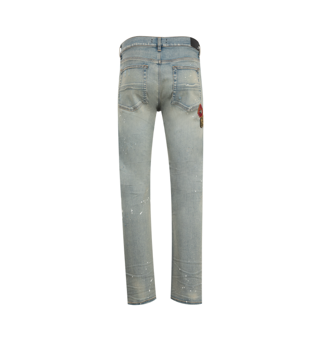 Image 2 of 3 - BLUE - Amiri Vintage Patch Slim Jeans are a 5-pocket style with overall distressing, patch appliques, and a leather logo label at the back. 92% cotton, 6% elastomultiester  