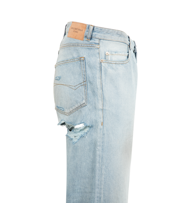 Image 3 of 3 - BLUE - BALENCIAGA Distressed Relaxed Fit Pants featuring cotton denim, dirty details, worn-out details, mid-waist, covered zip fly, 5 pockets, 5 belt loops, Balenciaga engraved flex button and Balenciaga Jeans patch at back. 100% cotton. Made in Italy. 