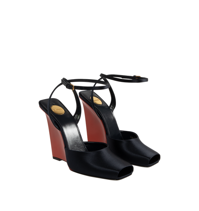 Image 2 of 4 - BLACK - SAINT LAURENT La Scandale Wedges featuring a square open toe, contrasting covered heel, adjustable ankle strap and round saint laurent-engraved metal plaque on the insole. 4.3 inch heel. Viscose, silk, sheepskin, metal. Made in Italy. 