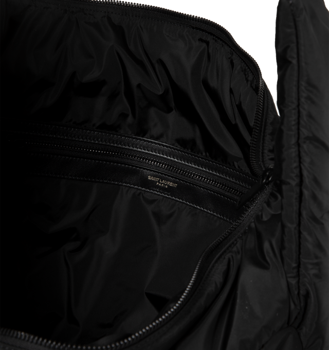 Image 3 of 3 - BLACK - Saint Laurent Multi-Pocket Puffer Bag is a shoulder style with exterior cargo pockets, an adjustable strap, and leather trim.  