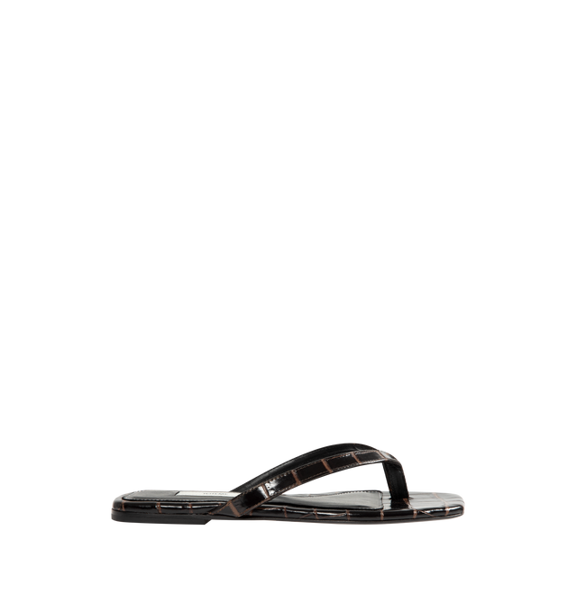 Image 1 of 4 - BROWN - Toteme Women's Croco-Embossed Flip-Flops are crafted from croc-embossed leather and feature a minimalist thong silhouette with an open square toe. Designed with a padded sheepskin footbed featuring a subtle logo patch, these designer sandals are finished with a calfskin leather sole for a refined take on an everyday warm-weather essential. Part of Toteme's Garderob collection. Upper: Leather. Footbed: Sheepskin. Sole: Calfskin Leather. Color: Dark Brown. Made in Italy. 