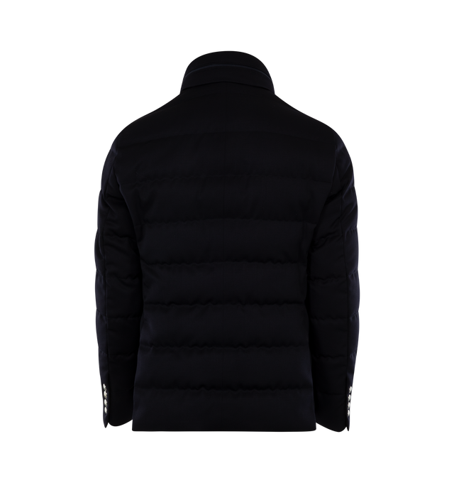 Image 2 of 3 - NAVY - MONCLER Bess Short Down Jacket featuring woven wool gabardine, nylon lger lining, down-filled, pull-out, adjustable rainwear hood with elastic drawstring fastening and snap buttons, contrasting-colored interior piping, ribbed knit collar, inner front bottom with tricolored detailing, zipper and snap button closure, zipped external and internal pockets and leather logo. 100% virgin wool. Lining: 100% polyamide/nylon. Padding: 90% down, 10% feather. 