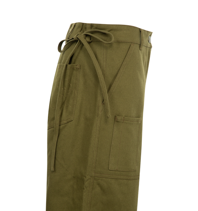 Image 3 of 3 - GREEN - Cecilie Bahnsen Anita Trousers are a 4-pocket style with a zip fly, pleats, a self-tie fastening at the back, contrast stitching, back pockets, and a patch pocket with a pen slot at the front. Lined. 76% cotton, 24% organic cotton. Made in Portugal.  