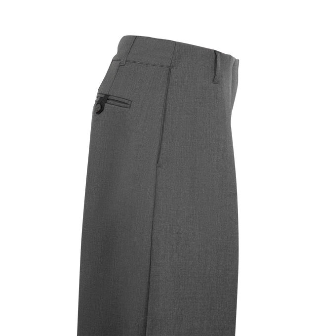 Image 3 of 3 - GREY - Jacquemus Women's The Ovalo Pants are crafted from a stretch wool blend and features a mid-high rise, a wide curved-leg silhouette, and a fully lined construction. Designed with stitched-down pleats, a set-in waistband, and a split-back waistband, these sculptural trousers balance tailored structure with fluid volume. Finished with side-seam pockets, belt loops, a zip fly with hook-and-bar closure, and a welt back pocket accented by a signature "J" belt loop. Main Material: 53% Polye 