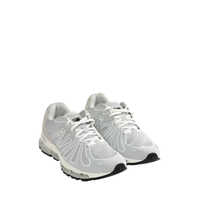 Image 2 of 5 - GREY - New Balance 1890 Unisex Sneakers feature a synthetic upper with a classic lace-up silhouette. Designed with ABZORB midsole cushioning for enhanced impact absorption, all-day comfort, and a durable rubber outsole. Upper: Synthetic; Midsole: ABZORB.  