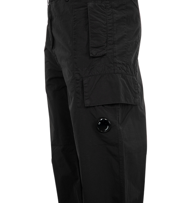 Image 4 of 4 - BLACK - C.P. Company Flatt Nylon Loose Utility Cargo Pants featuring three-pocket styling, zip-fly, cargo pocket at outseam, acetate lens at outseam, tucks at knees and logo patch at back pocket. 100% polyamide. 