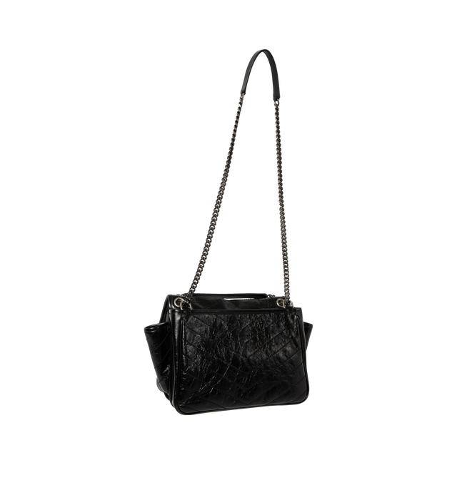 Image 2 of 4 - BLACK - Saint Laurent Womens Shoulder Bag is crafted from vintage calfskin leather. Features signature Cassandre logo, chevron-quilted topstitching, sliding chain strap for shoulder or crossbody wear, magnetic flap closure, three main compartments, one flat pocket, one zip pocket, cotton lining, and silver-tone hardware. Main Material: Calfskin Leather; Lining: Cotton; Hardware: Silver. Made in Italy. 