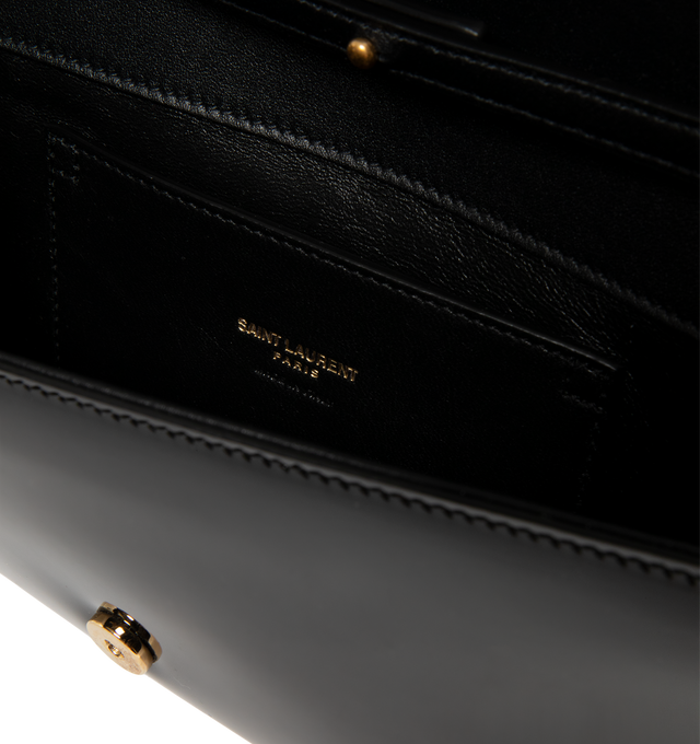 Image 3 of 3 - BLACK - Saint Laurent Women's Kate Clutch is crafted from black patent calfskin leather and decorated with the Cassandre emblem. The magnetic-snap design features a removable chain strap for clutch, shoulder, or crossbody wear, a leather-lined interior, and one flat pocket. Fits a large phone, slim card case, and keys. Main Material: 90% Calfskin Leather, 10% Metal. Dimensions: 28 x 14 x 3 cm / 11 x 5.5 x 1.2 in. Strap Drop: 35 cm / 13.8 in. Made in Italy. 