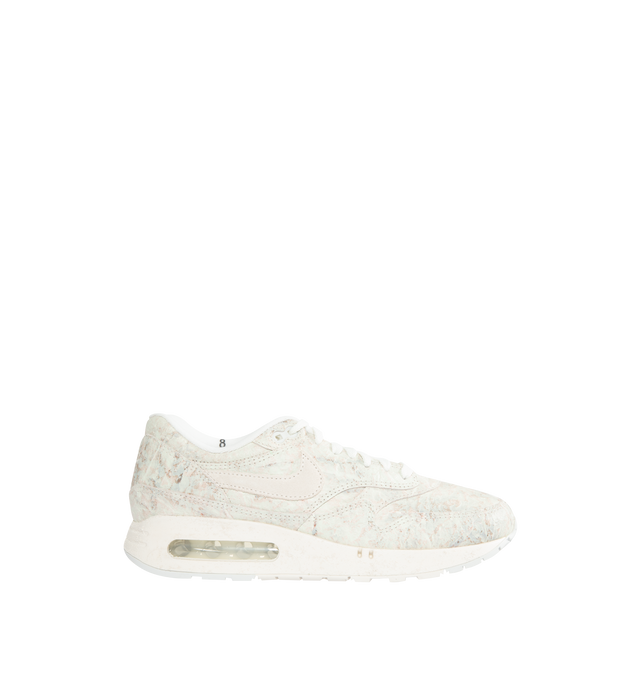Image 1 of 5 - WHITE - NIKE AIR MAX 1 '86 OG features the 4-window design, synthetic upper, water resistance in all-weather conditions, traction for the Course and updated traction pattern. 