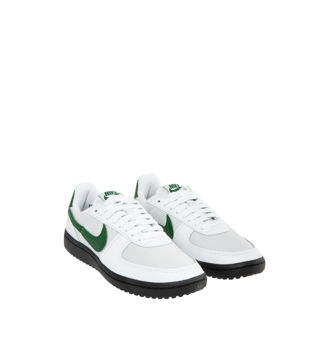 Image 2 of 5 - GREEN - Nike Field General '82 lace-up low-top sneakers in NY Jets green colors with gritty football style, smooth and perforated leather upper with black swoosh, nubby Waffle outsole with a black finish. 