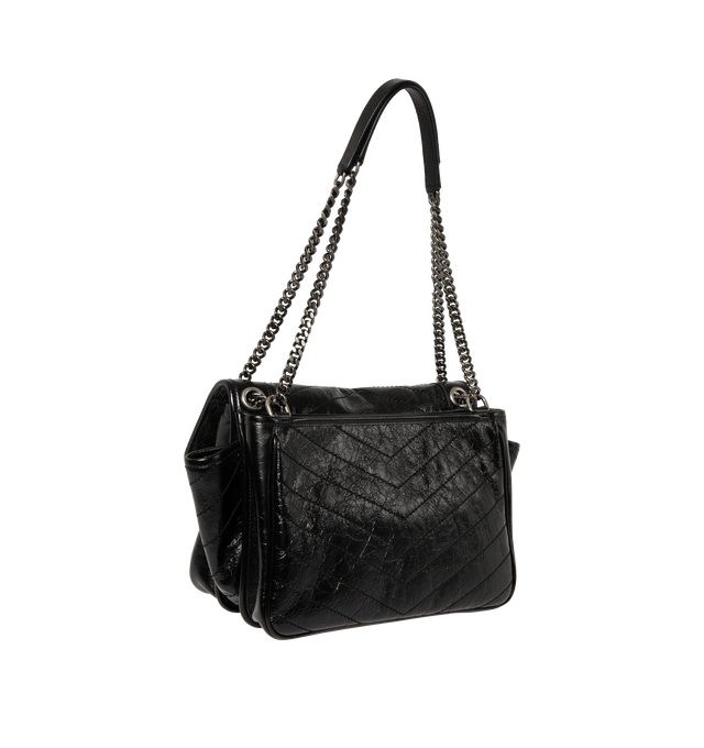Image 3 of 4 - BLACK - Saint Laurent Womens Shoulder Bag is crafted from vintage calfskin leather. Features signature Cassandre logo, chevron-quilted topstitching, sliding chain strap for shoulder or crossbody wear, magnetic flap closure, three main compartments, one flat pocket, one zip pocket, cotton lining, and silver-tone hardware. Main Material: Calfskin Leather; Lining: Cotton; Hardware: Silver. Made in Italy. 