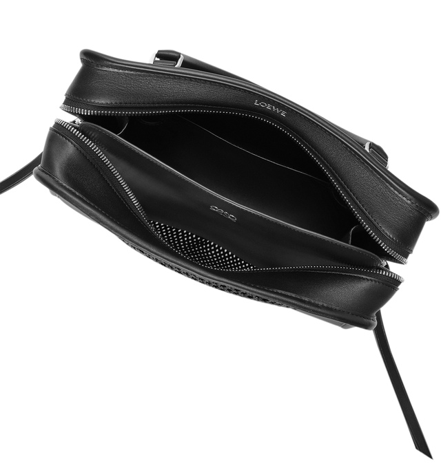 Image 10 of 14 - BLACK - Loewe Women's Medium Amazona 180 Bag is crafted from woven nappa calfskin and features a relaxed silhouette inspired by one of the house's iconic designs. Designed with a single Toron top handle and removable shoulder strap, it can be carried by hand, over the shoulder, or crossbody. A concealed magnetic closure, zip fastening with dual leather pullers, two compartments, an internal flat pocket, and a side D-ring provide functional organization. Finished with palladium-tone hardware 