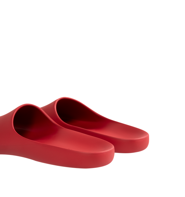 Image 4 of 5 - RED - THE ROW Ama Slide featuring smoothly curved slide sandal in lightweight rubber with contoured footbed and seamless construction. 100% rubber. Made in Italy. 