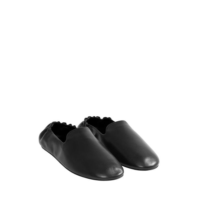 Image 2 of 4 - BLACK - THE ROW Casa Slipper featuring slip-on shoe in soft nappa leather with round toe, elasticated heel and flexible leather sole. 100% lambskin leather. Calfskin leather sole. Made in Italy. 