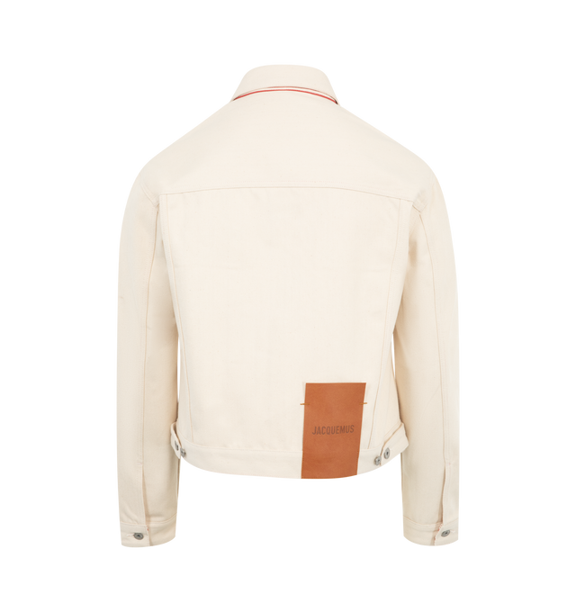 Image 2 of 3 - WHITE - Jacquemus De Nimes Denim Jacket has a spread collar, a button front closure, chest pocket with button flaps, and seam pockets. 52%, 48% cotton.  Made in Portugal.  