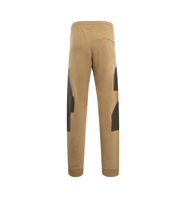 Image 2 of 3 - BROWN - DRIES VAN NOTEN Loose Sweatpants featuring placed print, loose fit, straight leg, side slit pockets and back zip pocket, rib hem borders and elasticated waistband. 100% cotton. 