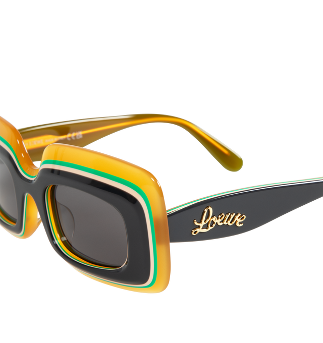 Image 3 of 3 - BLACK - LOEWE PAULA'S IBIZA Layered Sunglasses featuring acetate rectangle frames layered with contrasting stripes and are stamped with cursive logo lettering along the temples. 100% UV protection. 