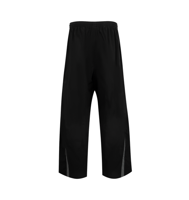 Image 2 of 3 - BLACK - Balenciaga Tracksuit Pants have an elastic waist, side pockets, contrasting yokes, and a loop sports icon embroidered on the leg. 100% polyester. Made in Italy.  