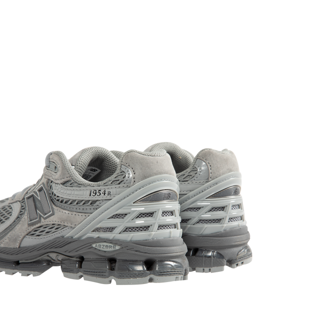Image 3 of 5 - GREY - New Balance 1954R Unisex Sneakers feature a suede and mesh upper inspired by the 2002 and 1906 models, combining breathable mesh with synthetic and pig suede overlays. ABZORB midsole cushioning absorbs impact through a combination of cushioning and compression resistance, while a traditional lace-up closure provides an adjustable fit. Upper: Synthetic, Mesh, and Pig Suede.  