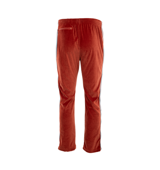 Image 2 of 4 - RED - NEEDLES Narrow Track Pants featuring cotton-blend velour, concealed drawstring at elasticized waistband, three-pocket styling, logo graphic embroidered at front, pinched seam at legs, striped webbing trim at outseams, creased legs at back and unlined. 77% cotton, 23% polyester. Made in Japan. 
