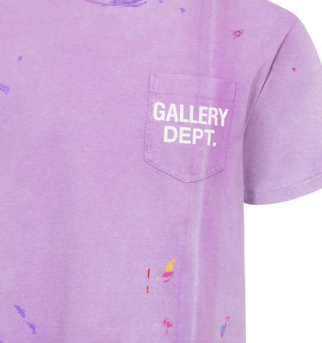 PURPLE - GALLERY DEPT. Vintage Logo Tee featuring boxy fit with understated ribbed accents at the neckline and cuffs, faded screen-printed logo on both front and back along with paint splatter. 100% cotton.