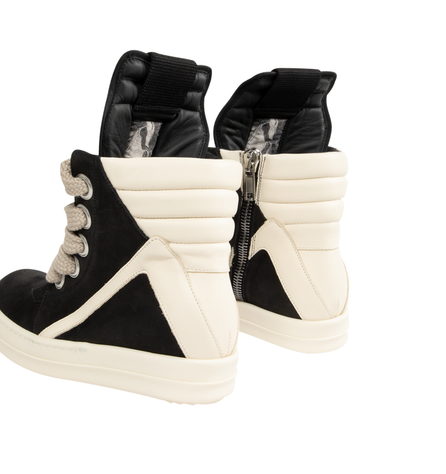 Image 3 of 5 - BLACK - RICK OWENS Jumbolace Geobasket Sneakers featuring high-top LWG-certified grained lambskin sneakers, perforated detailing at toe, lace-up closure, pull-loop at extended padded tongue, quilted padded collar, buffed calfskin lining and treaded rubber sole. Upper: lambskin, calfskin. Sole: rubber. Made in Italy. 